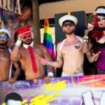 How is the rainbow flag used as a symbol today?